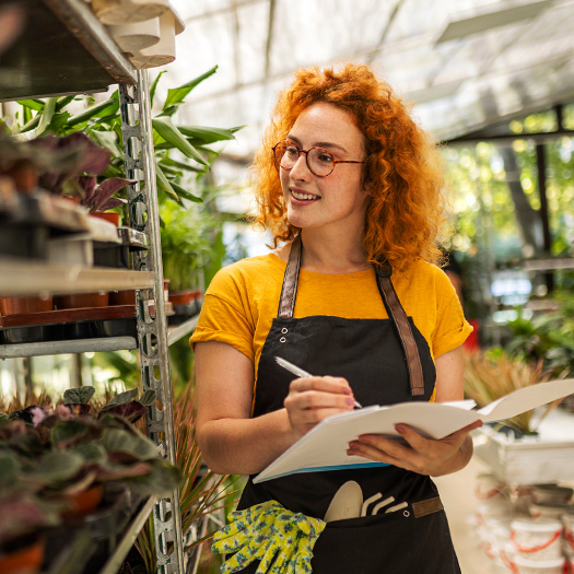 Small business owner doing inventory.