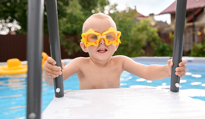 young kid swimming