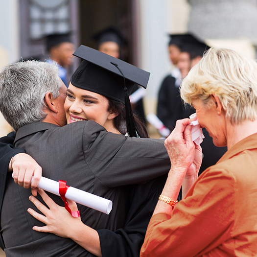 Parents celebrating with their graduate.