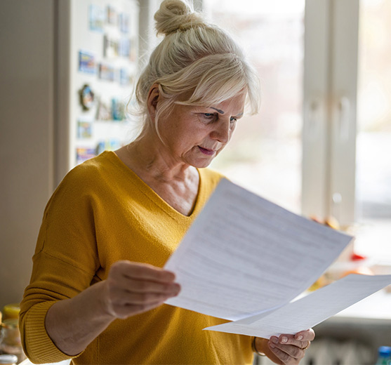 Woman checking her bank statements.