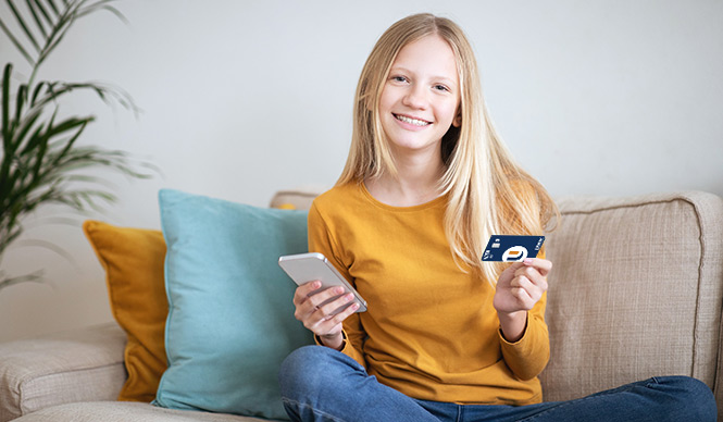 Teen with a debit card and a phone