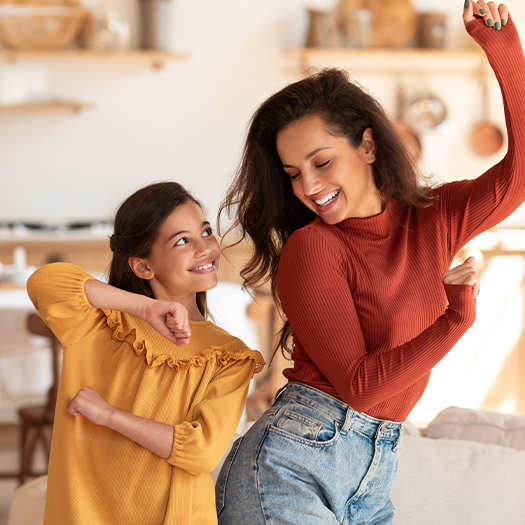mother and daughter dancing