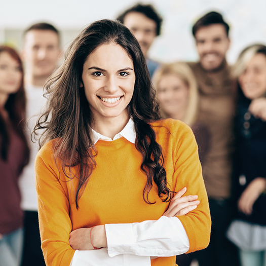 Young professional with a group of peers.