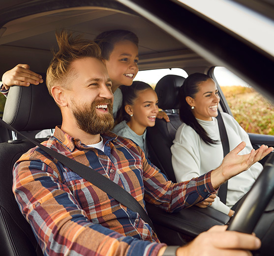 Happy family in vehicle 