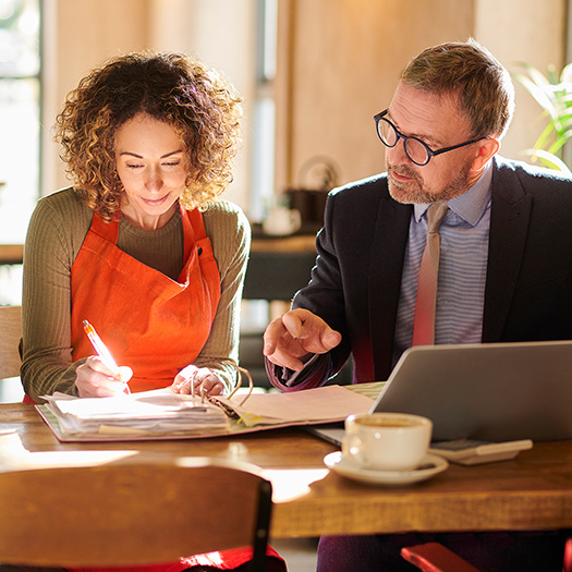 Small business owner with banker.