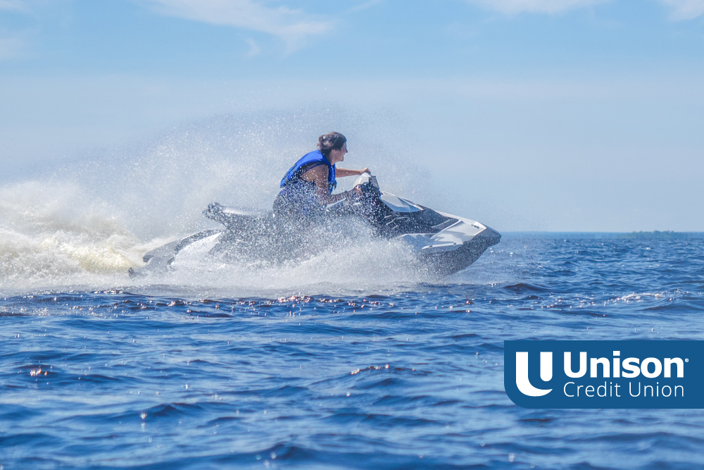 Person using jet ski on Wisconsin lake